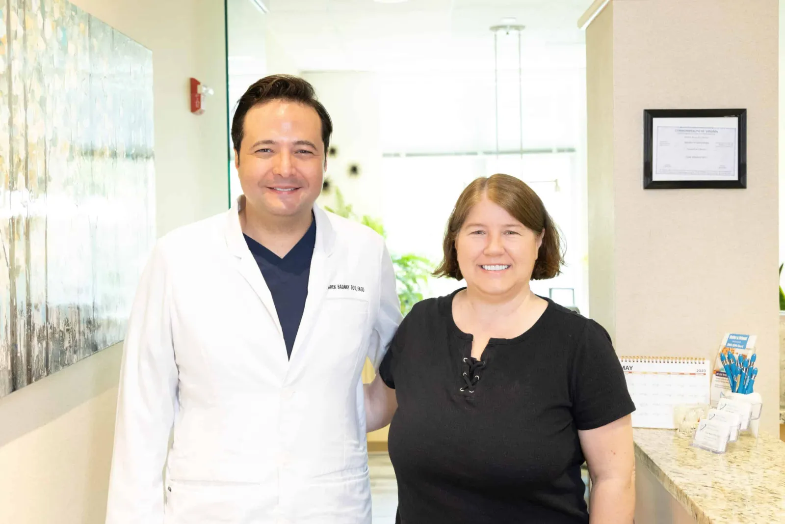 Dr. Tarek Badawy with a Westlake Dental guest in the office