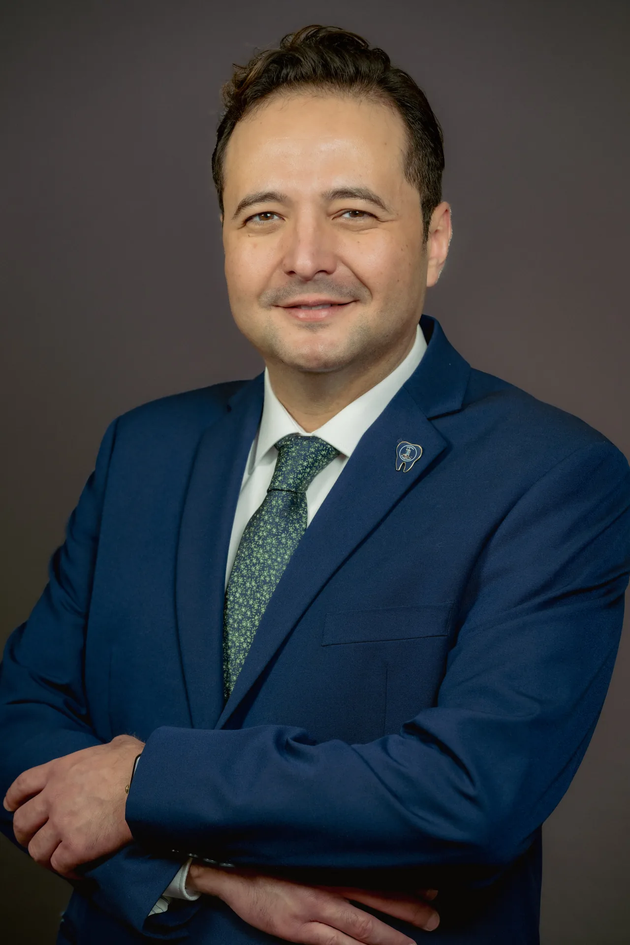 Dr. Tarek Badawy, who plans and places the practice's full-arch cases